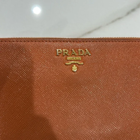 Prada Orange zipper wallet